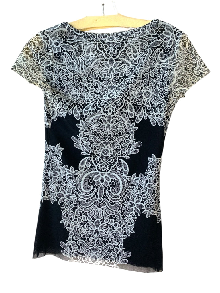 INC  xS TOP  W